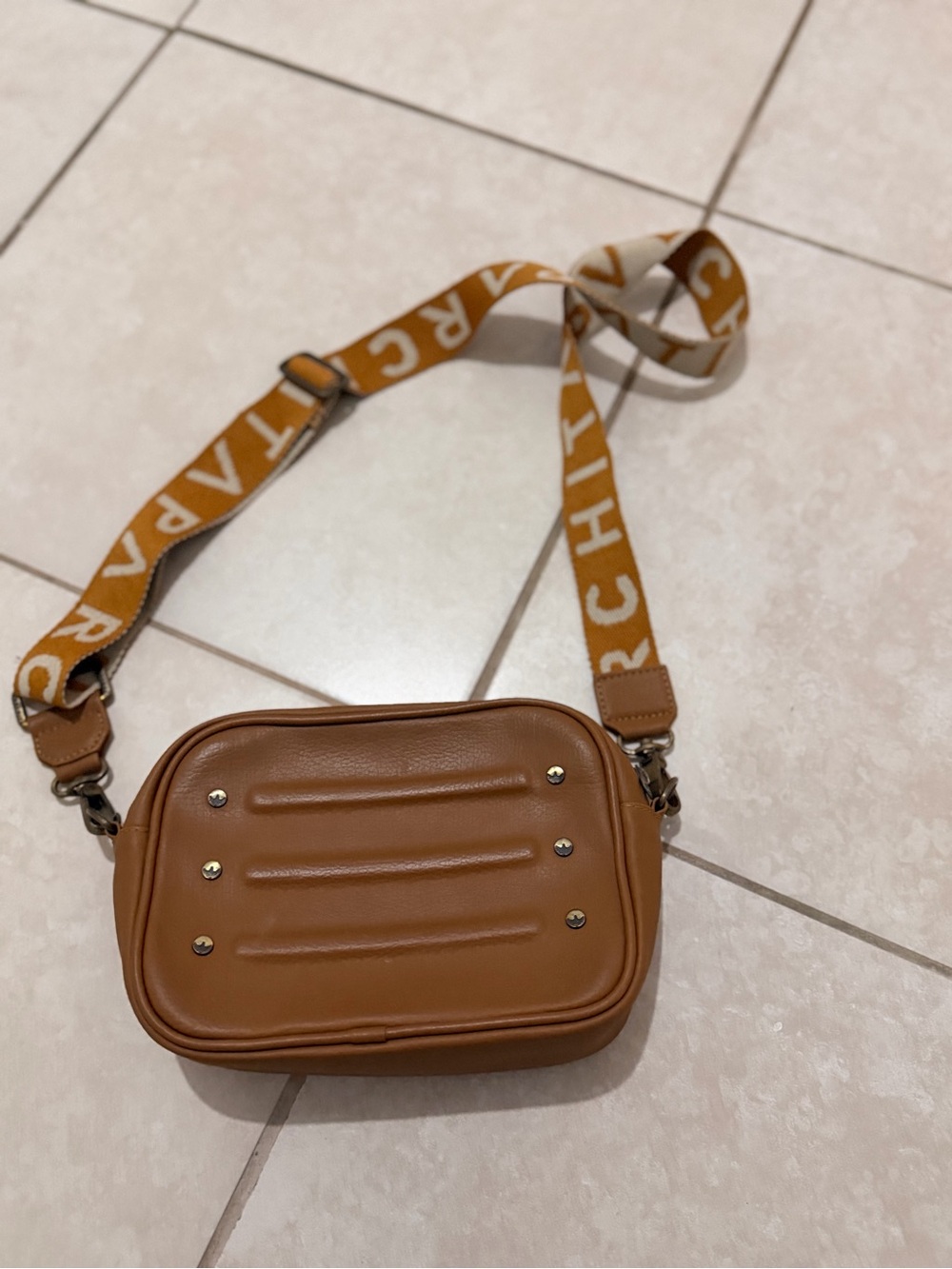 Brown Crossbody Camera Bag with Branded Strap